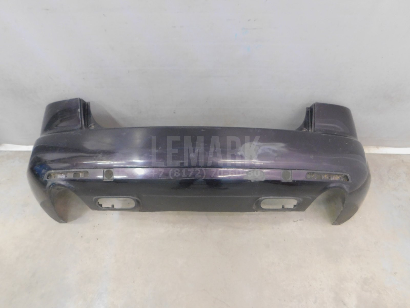Бампер задний Mazda CX7 2007> EG2150221