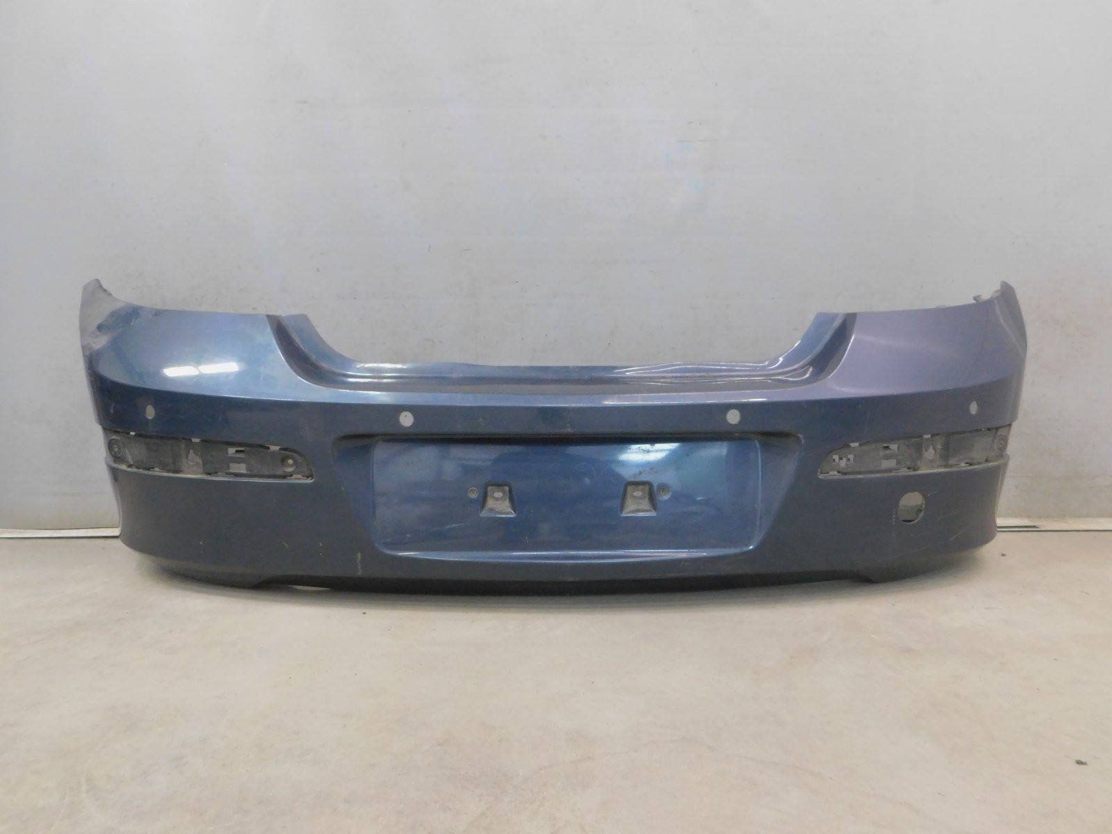 Бампер задний Opel Astra H 2004>