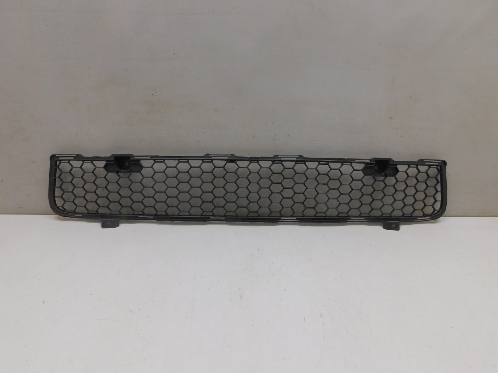 Решетка в бампер центральная Mitsubishi Lancer 2007>