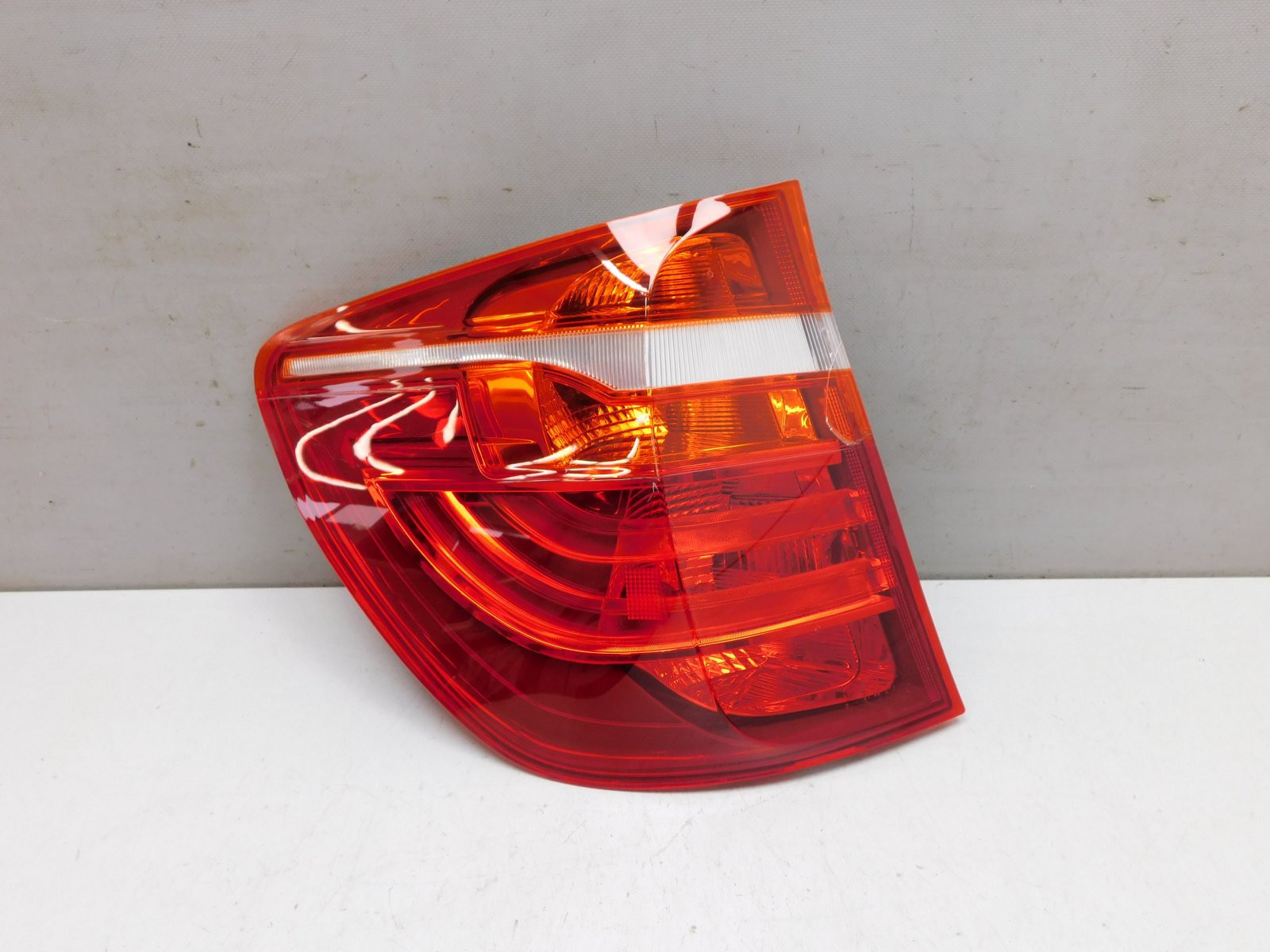 Фонарь задний наружный левый BMW X3 F25 2010>