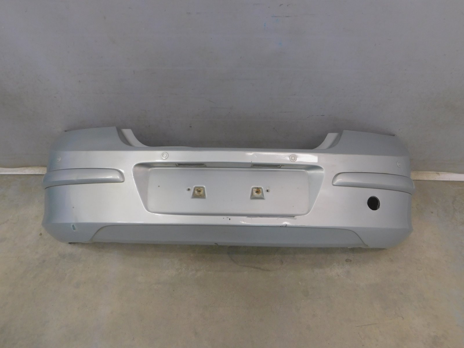 Бампер задний Opel Astra H 2004>