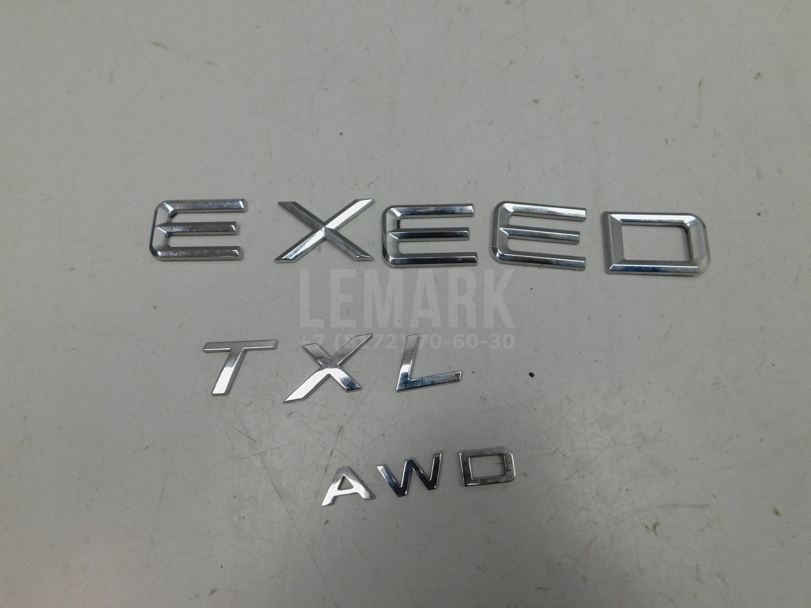 Эмблема Exeed TXL 2020> 609001301AA