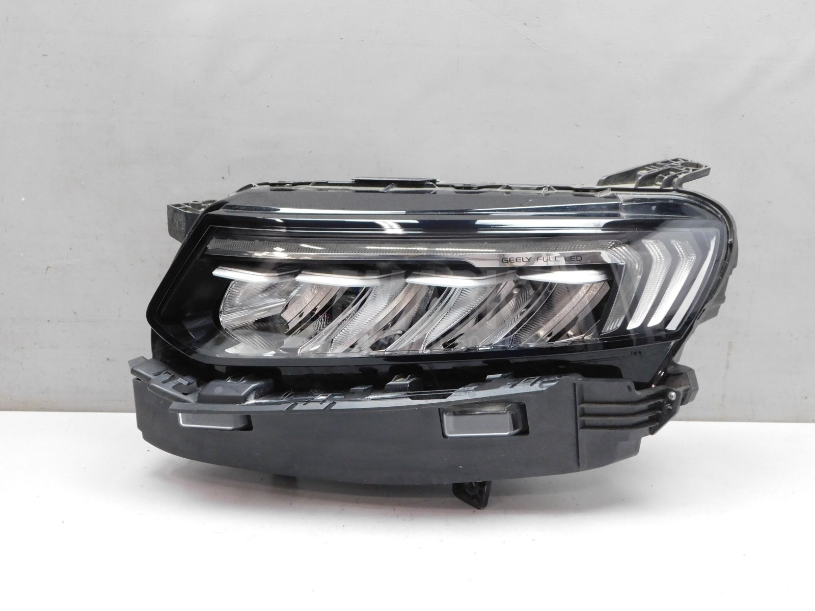 Фара левая Geely Tugella 2020> 7051026800