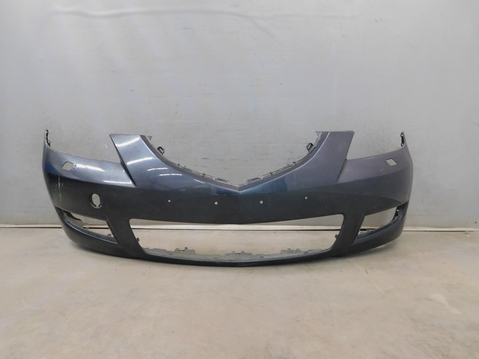 Бампер передний Mazda 3 (BK) 2003-2009