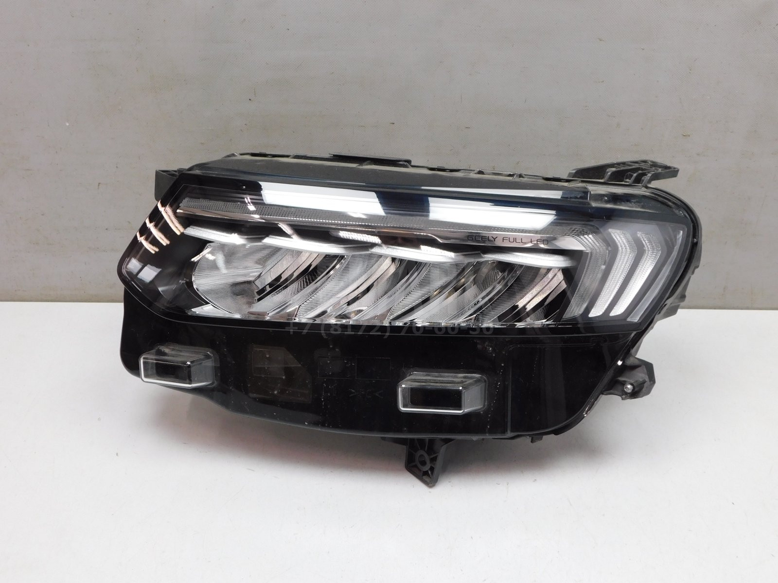 Фара левая Geely Tugella 2020> 7051026800