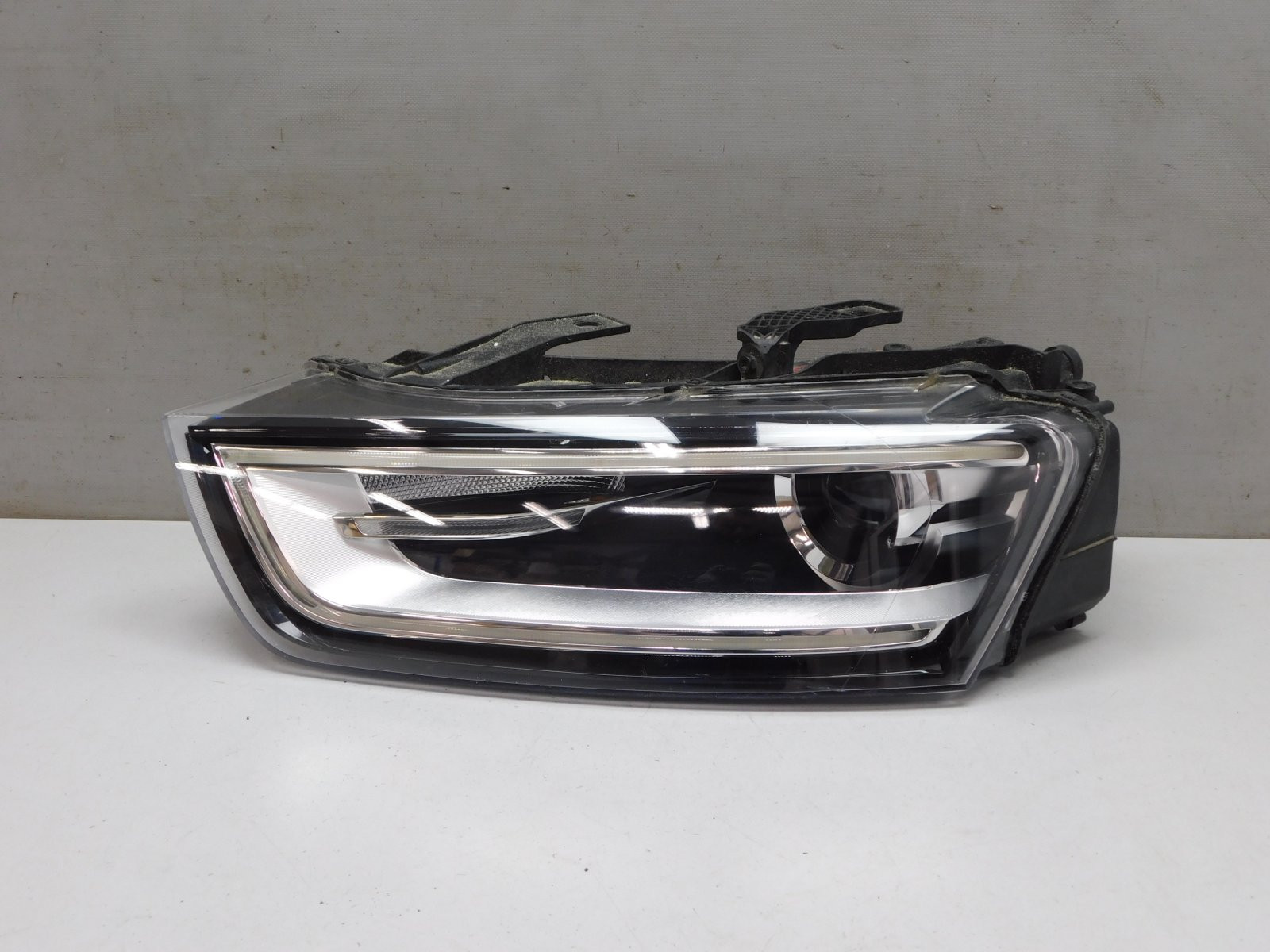 Фара левая Audi Q3 2012-2018