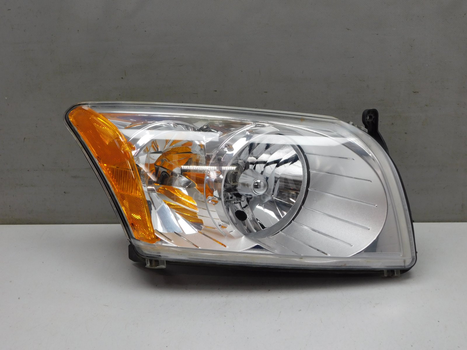 Фара правая Dodge Caliber 2006> 05303740AL