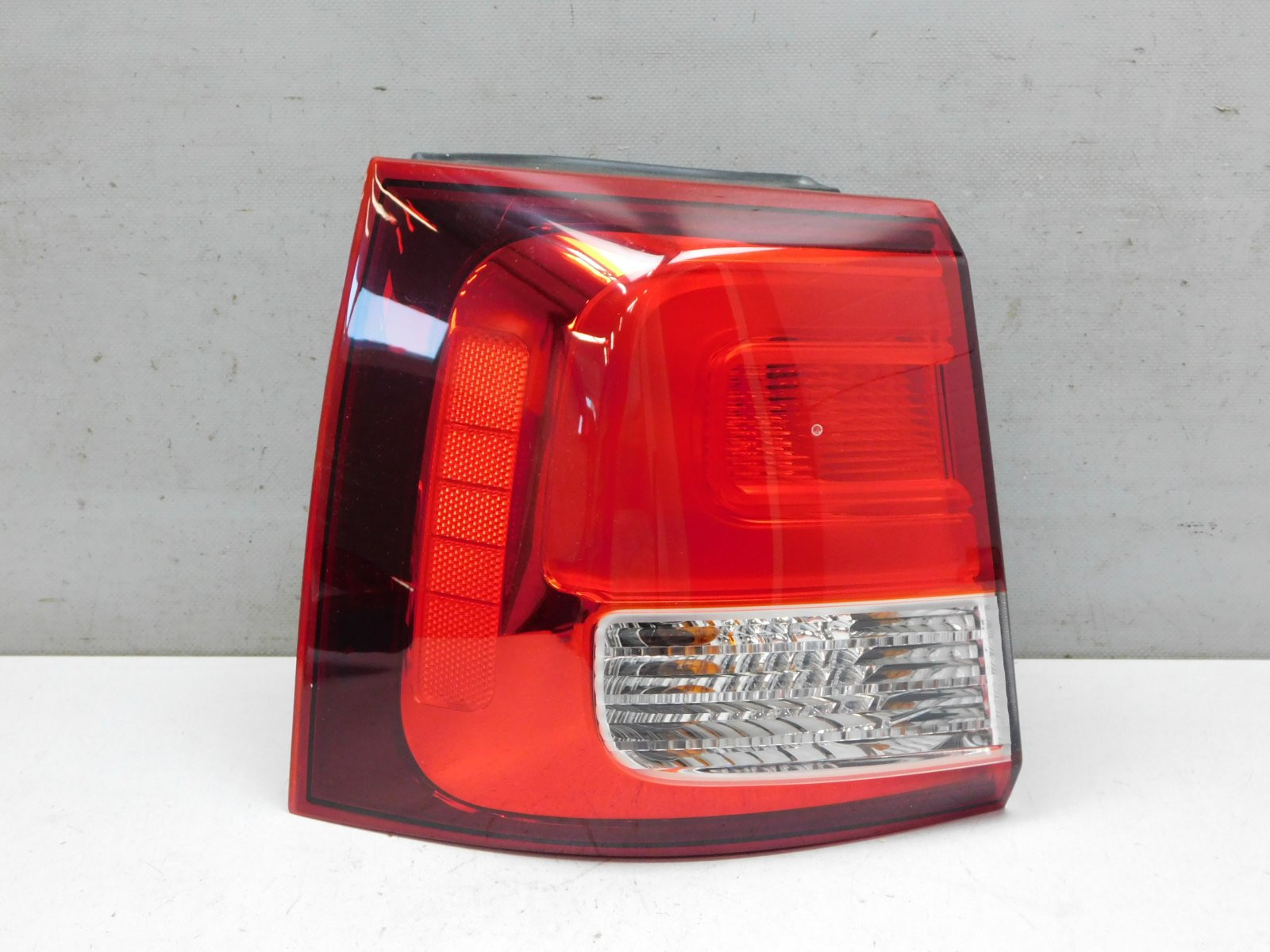 Фонарь задний наружный левый Kia Sorento 2009>