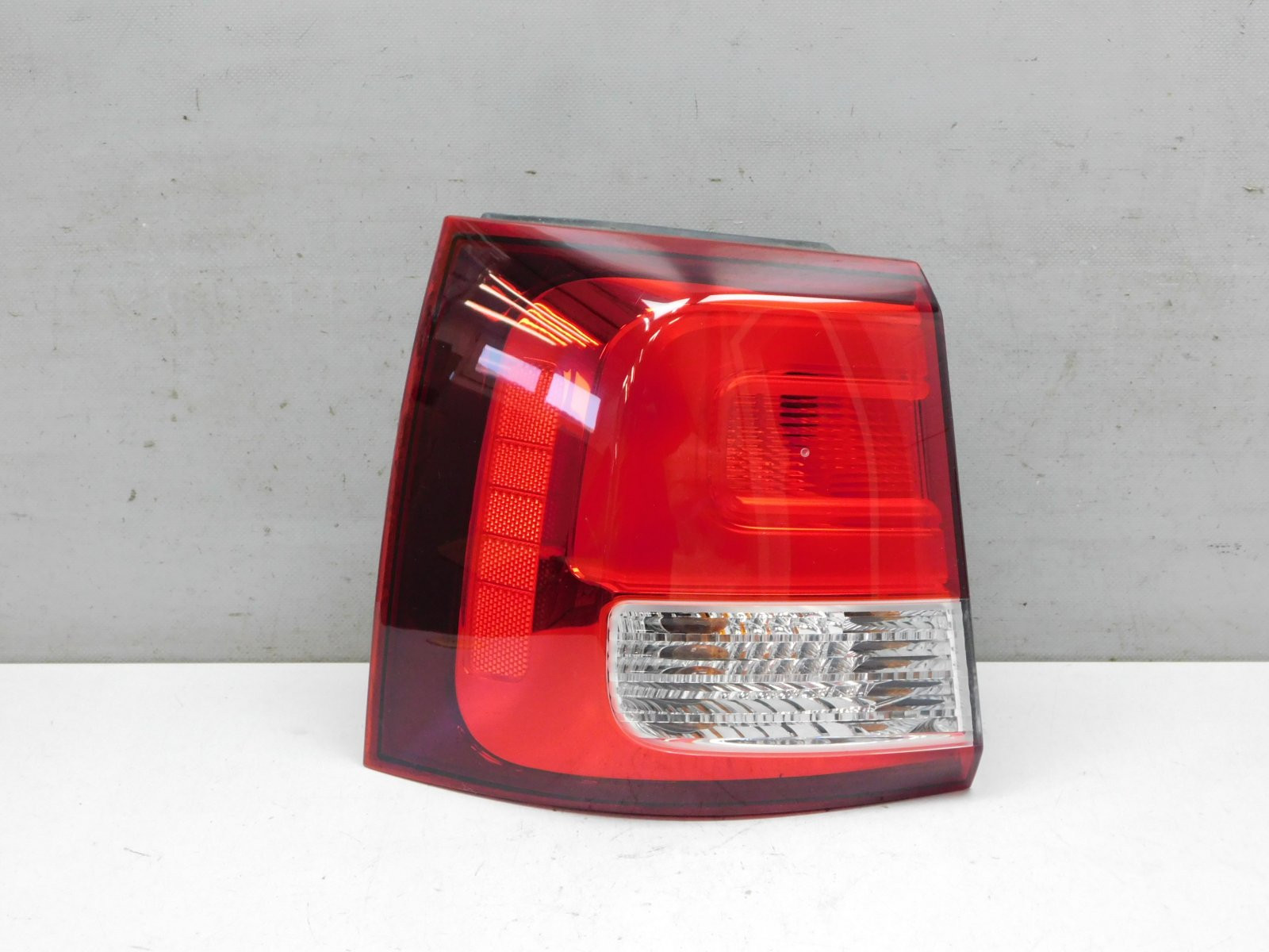 Фонарь задний наружный левый Kia Sorento 2009>