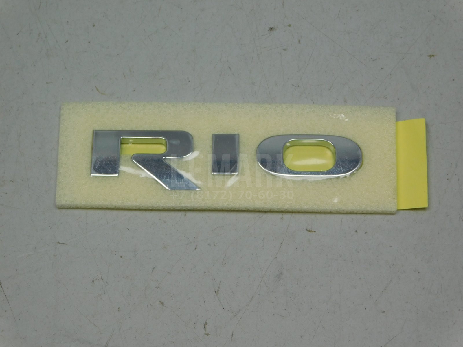 Эмблема Kia Rio 2011> Kia 863224Y000